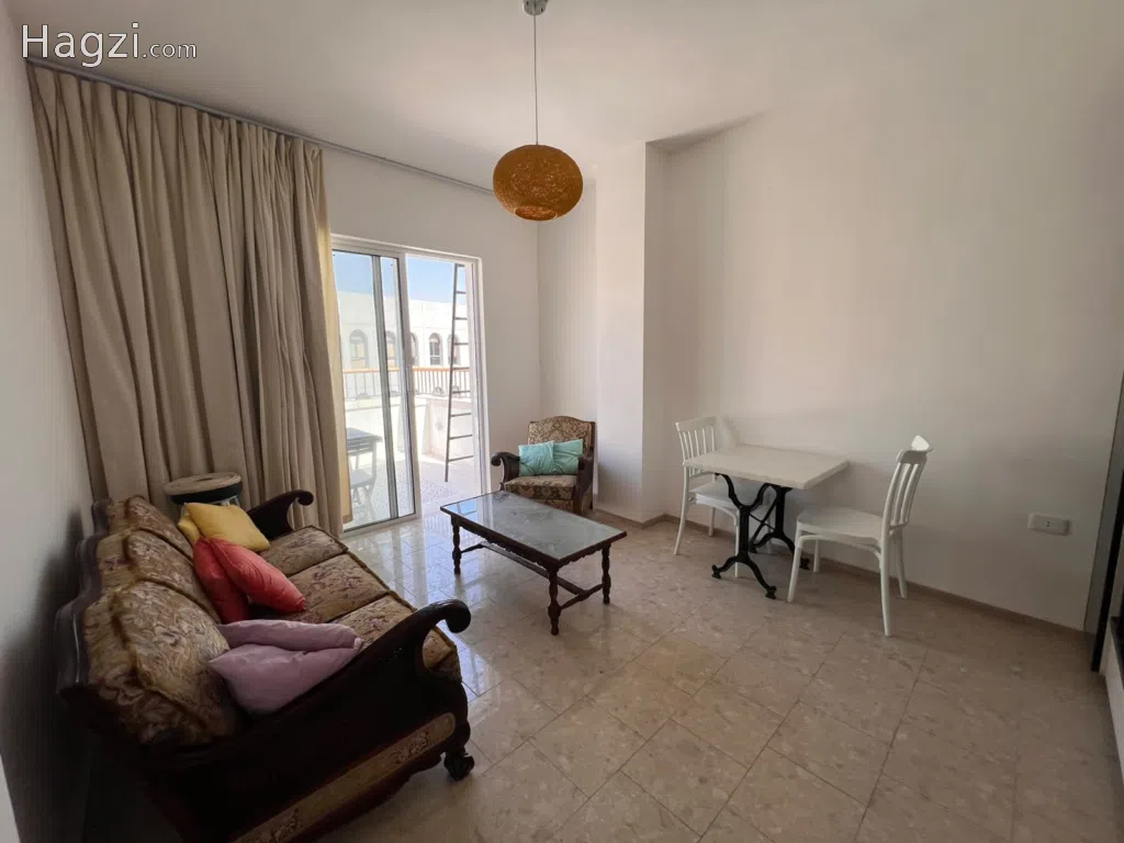 Experience Jabal Amman's Best: Beautifully Furnished 1-Bedroom Apartment Available for Rent! - Image 1