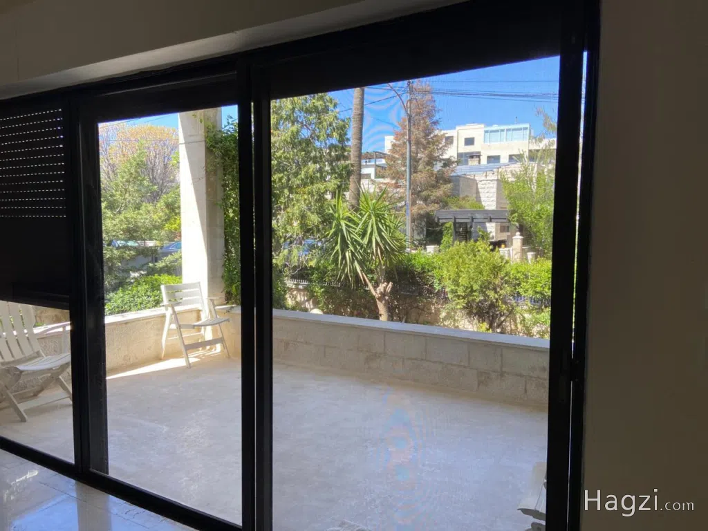 Three bedroom apartment for rent in Abdoun - Image 1