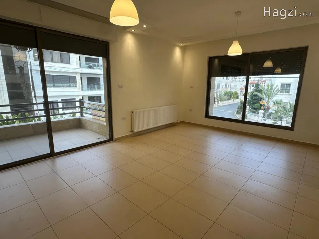 Unfurnished apartment for rent in Hay Al Sahabah - Image 1