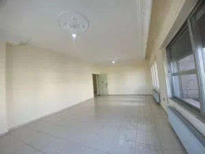 Unfurnished apartment for rent Dahyet Al Ameer Rashed - Secondary Image 1