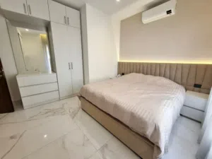 Spacious two-bedroom apartment with a shared rooftop. - Secondary Image 1