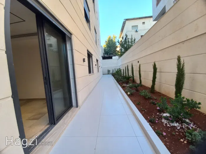 Four Bedrooms Apartment for Sale in Um Uthaina - Secondary Image 1