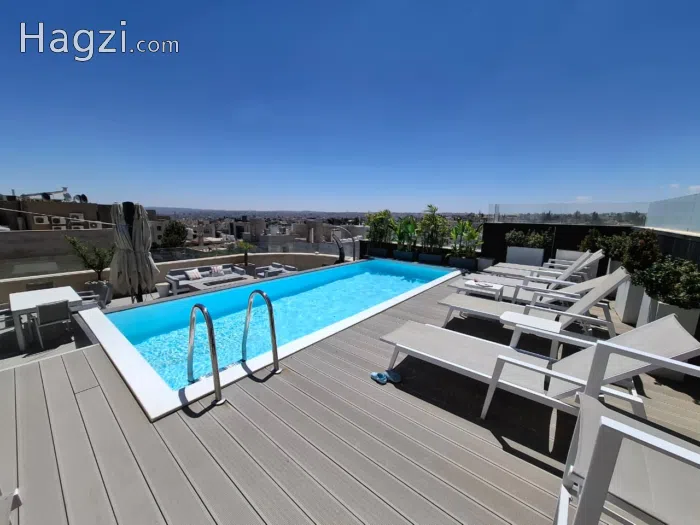 Spacious two-bedroom apartment with a shared rooftop.