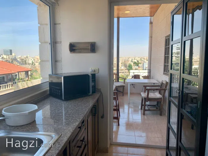 Charming 2-Bedroom Apartment in Al Weibdeh - Secondary Image 2