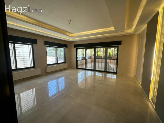 Unfurnished apartment for rent in Dahyet Al Nakheel - Secondary Image 1