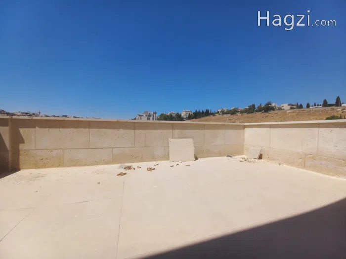 Unfurnished Apartment with Roof For Rent In Abdoun  - Secondary Image 1