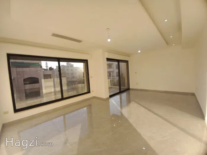 Unfurnished Three Bedrooms Apartment for Sale in Um Uthaina - Secondary Image 2