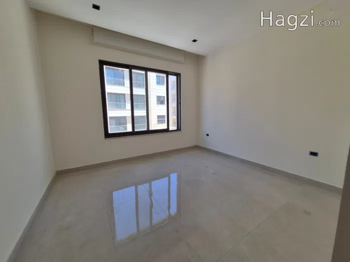 فرصة استثمارية بعائد ممتاز: شقة طابق ثاني فاخرة في أرقى مناطق عبدون - Secondary Image 3