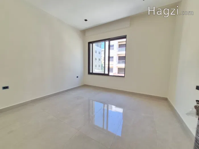 فرصة استثمارية بعائد ممتاز: شقة طابق أول فاخرة في أرقى مناطق عبدون - Secondary Image 3