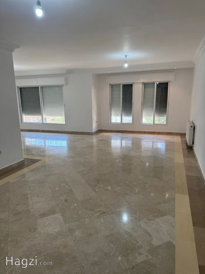 Unfurnished apartment for rent in Dahyet Al Ameer Rashed - Secondary Image 1