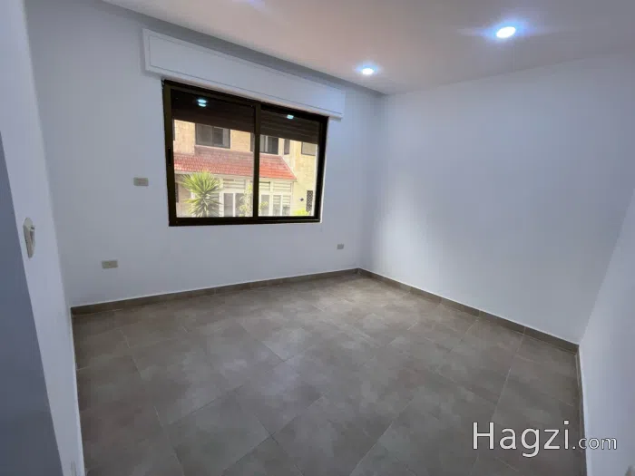 unfurnished apartment for rent in um alsummaq - Secondary Image 2