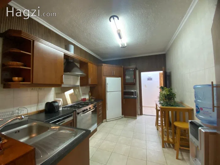furnished apartment for rent in 5th circle - Secondary Image 3