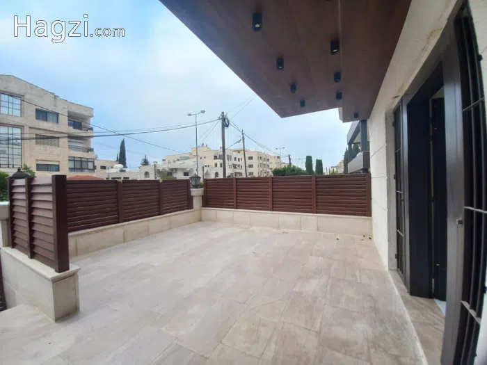 Semi furnished Three Bedrooms Apartment for Sale in Deir Ghbar - Secondary Image 1