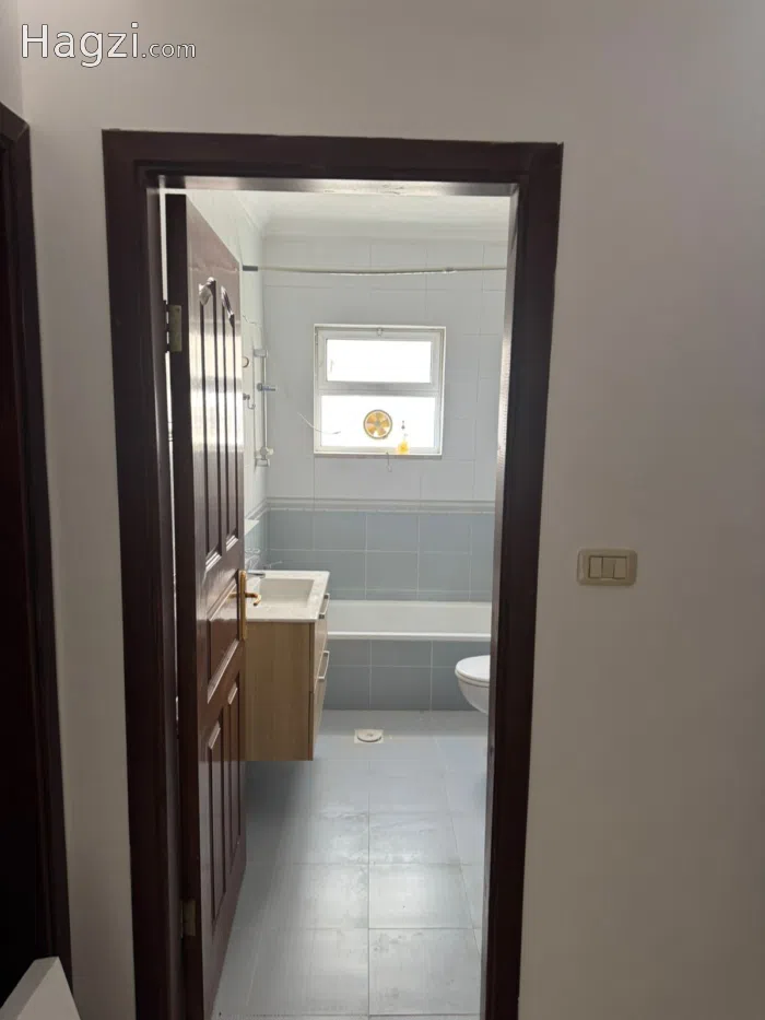 Unfurnished apartment for rent in Dahyet Al Ameer Rashed - Secondary Image 2