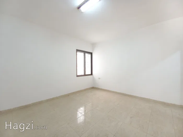 Unfurnished Apartment For Rent In Al Swefiyeh  - Secondary Image 1