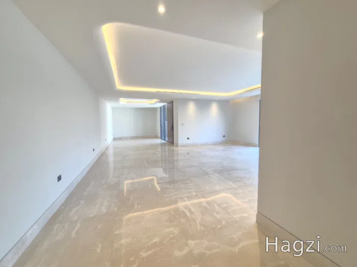 شقة شبه أرضي فاخرة 280م داخلي + 300م خارجي — الدوار الخامس، تصميم مودرن ومساحات واسعة - Secondary Image 2