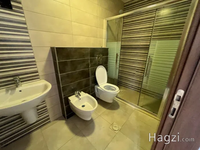 unfurnished apartment for rent in um alsummaq - Secondary Image 3